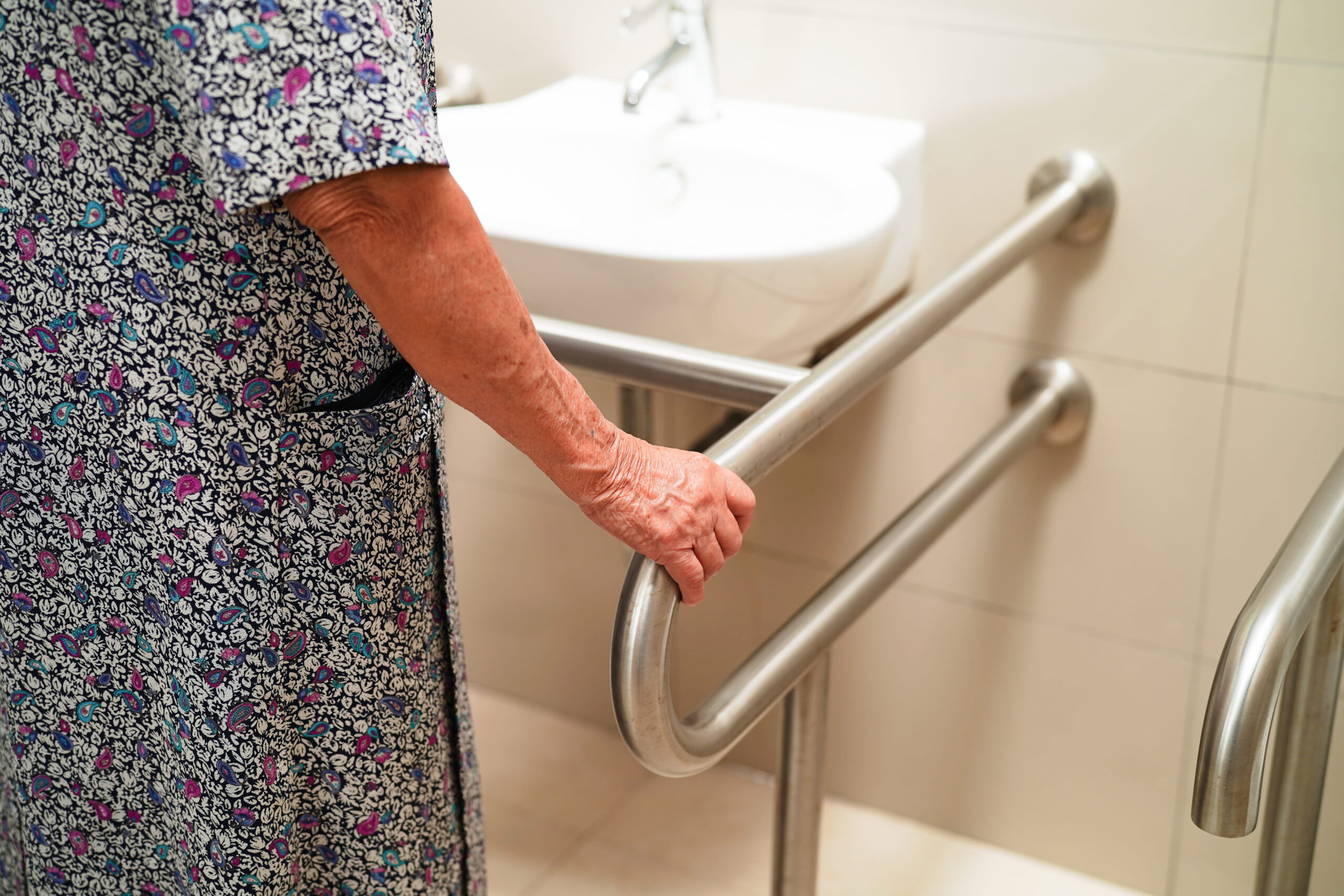 Accessible bathroom setup with grab rails supporting independence for NDIS participants