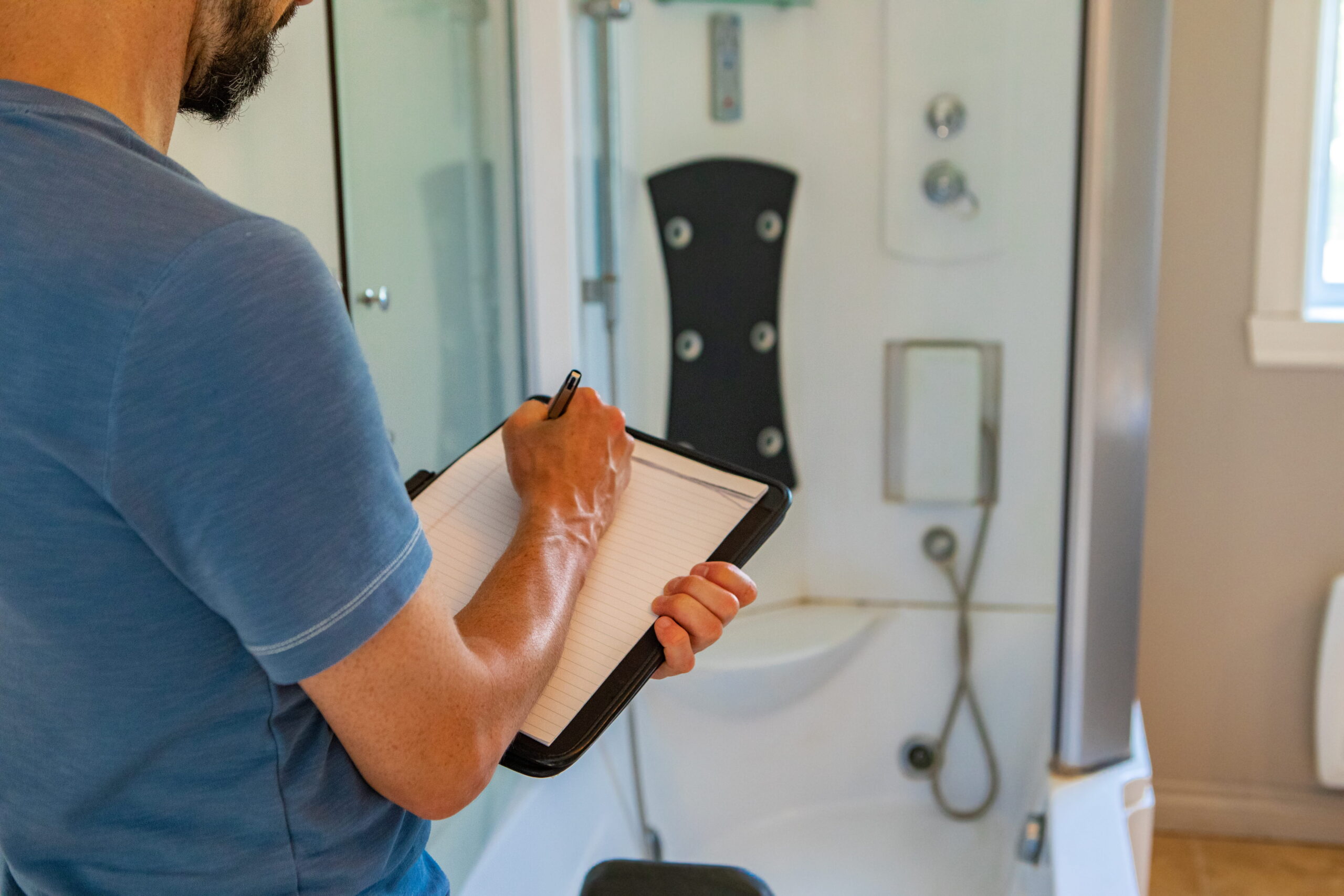 Occupational therapist discussing an NDIS bidet funding application with a participant.